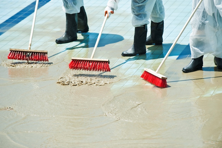 Applying Sealer coat to basement foundations