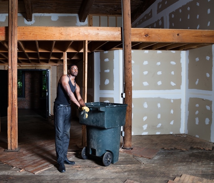 Cleaning all around a flooded house