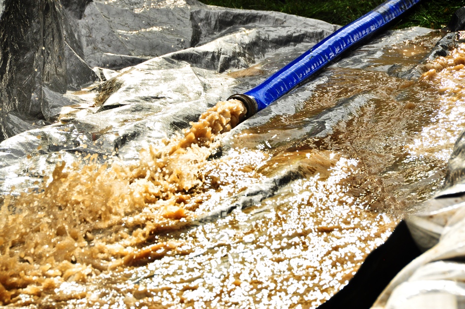 Applying Sealer coat to basement foundations